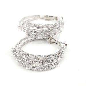 
            
                Load image into Gallery viewer, Tapered Baguette Hoops Rhodium
            
        